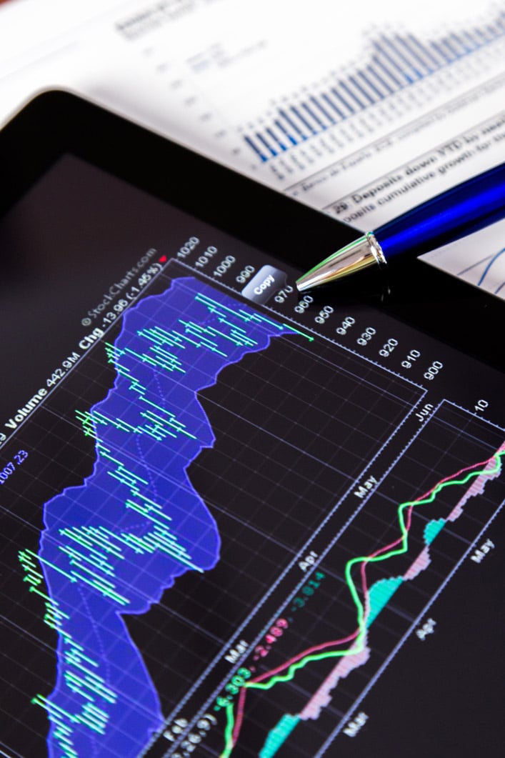 About us 2 digital tablet documents with business graphs